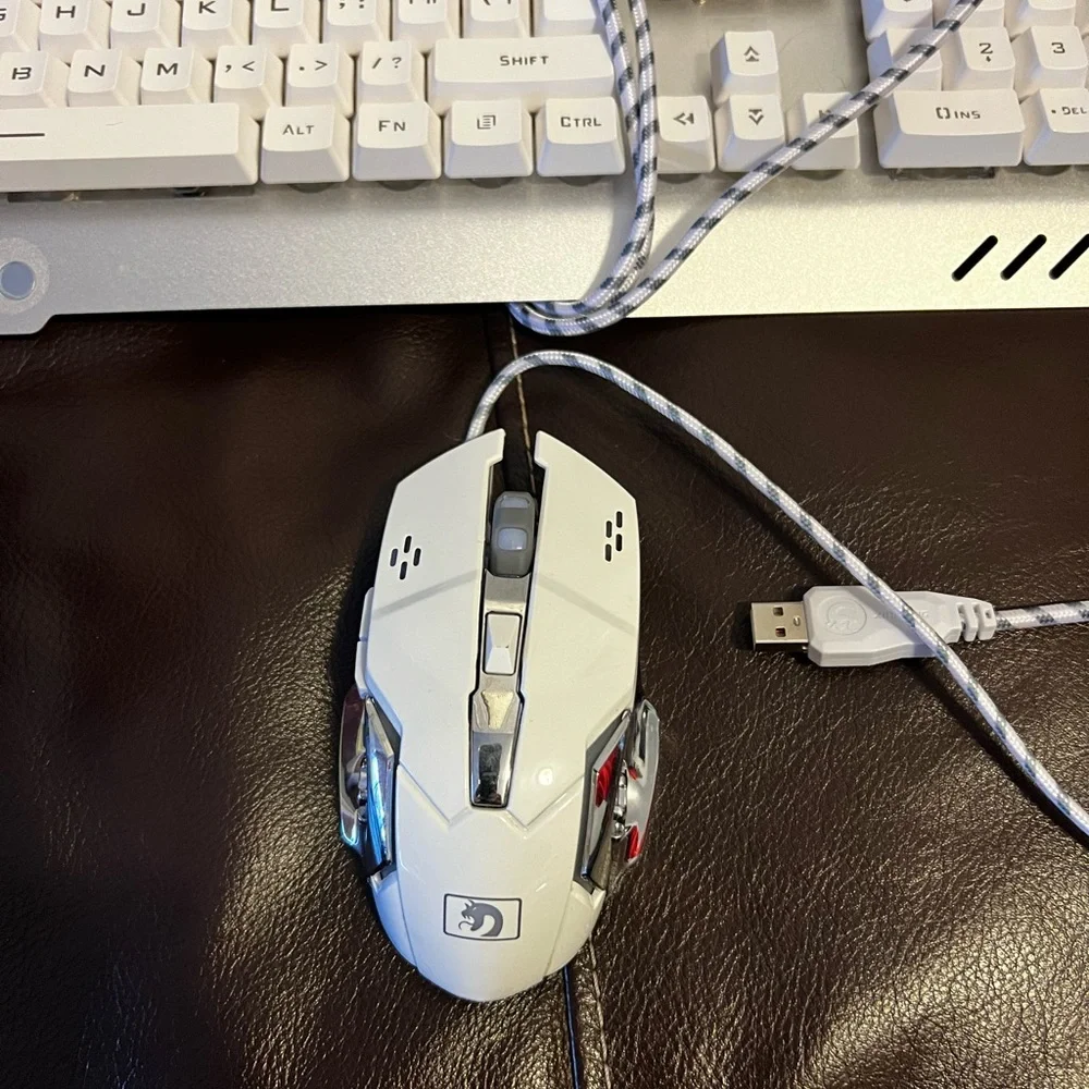 Gaming key board and headphones. Both hardly used.